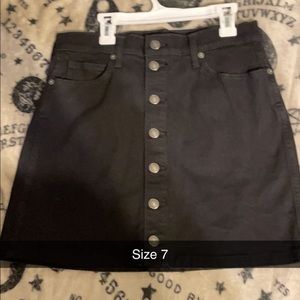 Black skirt with buttons down the front